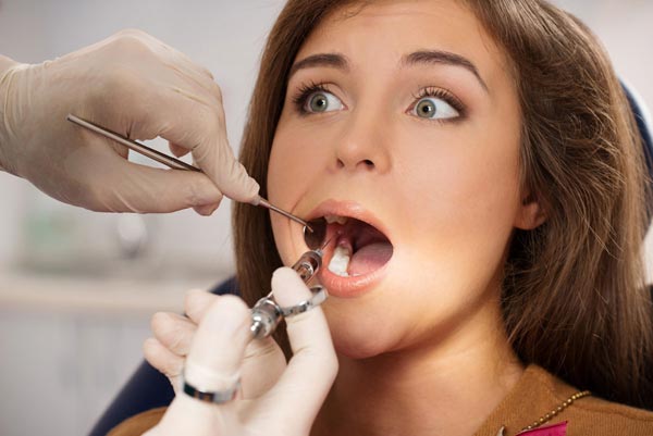 Хороший стоматолог лечит зуб только один раз